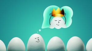 A line of eggs, and one egg is daydreaming to be king. This is symbolic to dreaming big, overconfidence and arrogance.