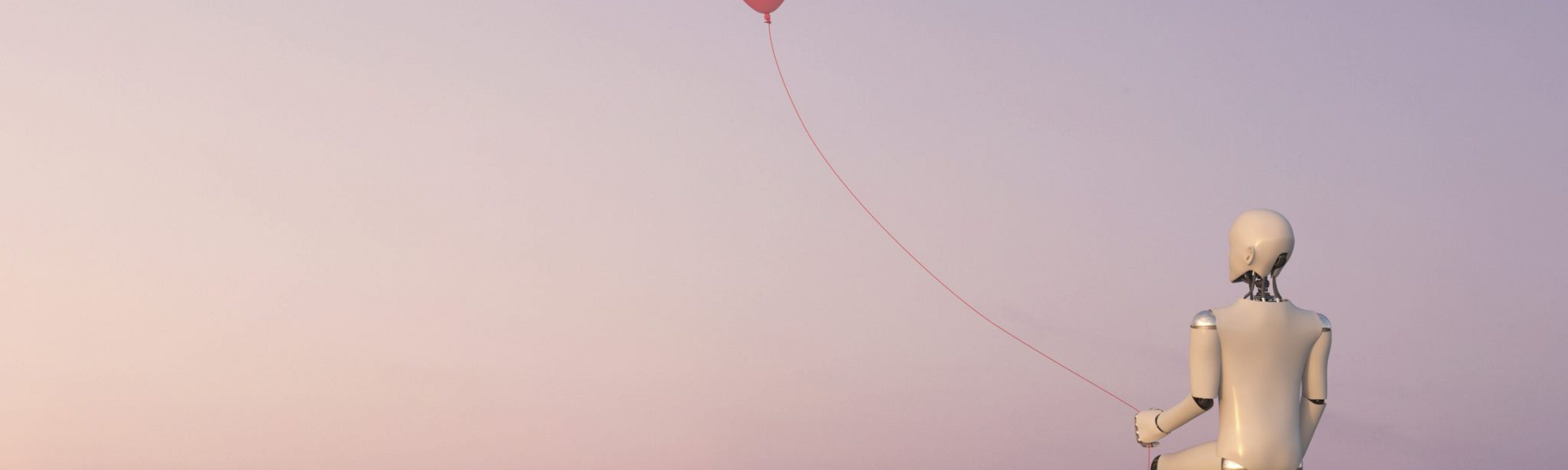 A white robot is sitting on the rooftop ledge of a building with the view of a city with lights, holding a red balloon. Business Impact article on Top tips to be a better daydreamer — and how it will help you.